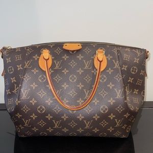 Louis Vuitton Fashioned from Monogram canvas with leather trim